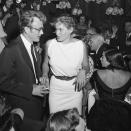 <p>Dean began seeing film newcomer Ursula Andress in 1955. Here, Dean and the Swiss-born actress arrive at a Hollywood party together.</p>