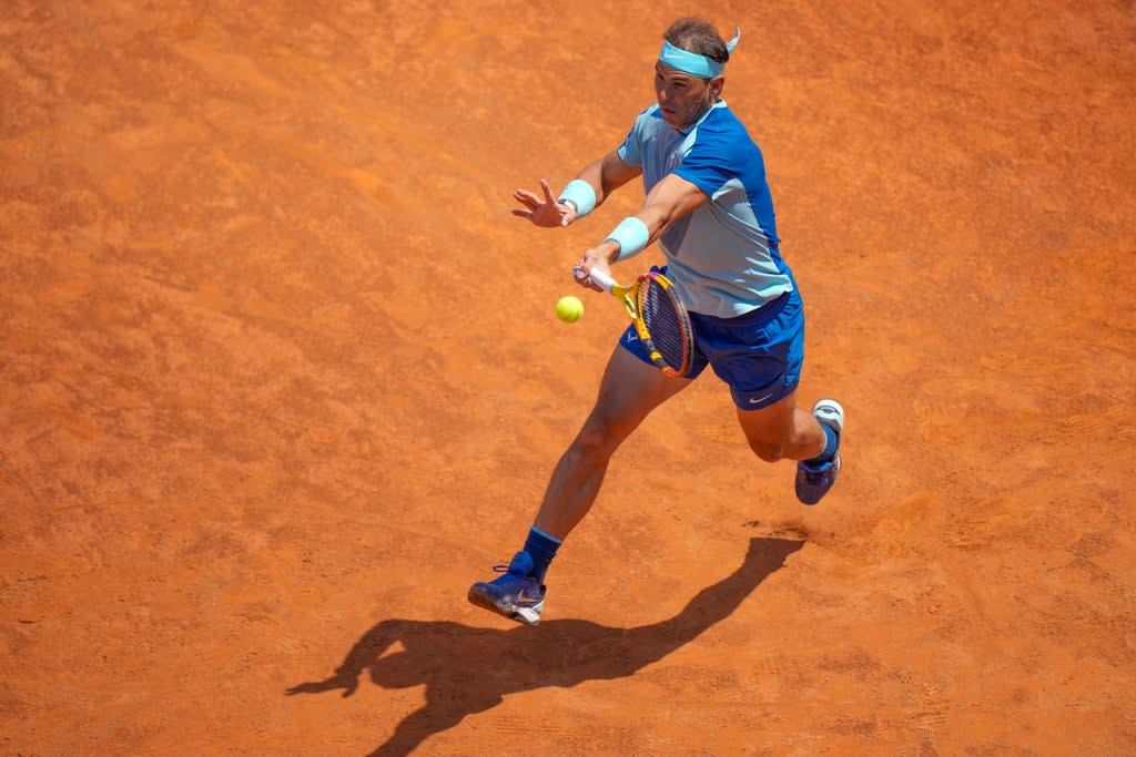 Rafael Nadal bounced back from his Madrid Open defeat to Carlos Alcarez to get the better of John Isner in straight sets at the Italian Open (AP Photo/Andrew Medichini/PA) (AP)