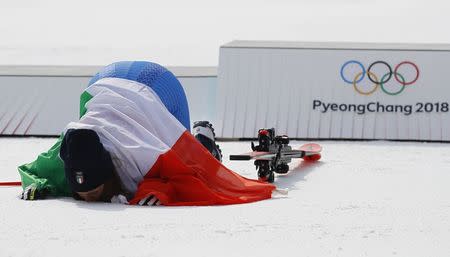 Alpine Skiing - Pyeongchang 2018 Winter Olympics - Women's Downhill - Jeongseon Alpine Centre - Pyeongchang, South Korea - February 21, 2018 - Sofia Goggia of Italy reacts during the victory ceremony. REUTERS/Leonhard Foeger