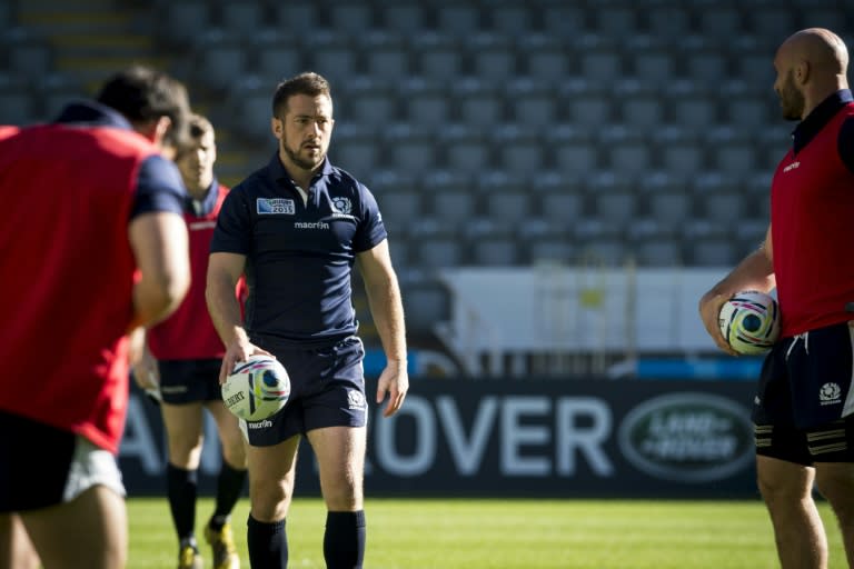 Scotland's captain and scrum half Greig Laidlaw (L) attends the captain's run training session at Saint James' park in Newcastle on October 2, 2015