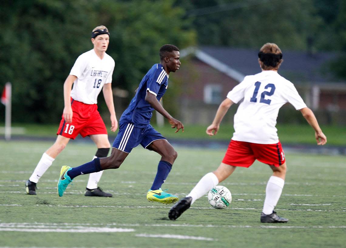 Bryan Station’s Diallo Irakoze dribbles against Lafayette at R. L. Grider Stadium on Aug. 21, 2018. Irakoze is back in Lexington and will be part of the first-ever USL League One roster for Lexington Sporting Club.