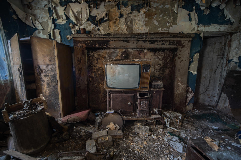 A television sits in a pile of rubble inside an abandoned home in Northern Ireland on March 12, 2018. (Photo: Unseen Decay/Mercury Press/Caters News)