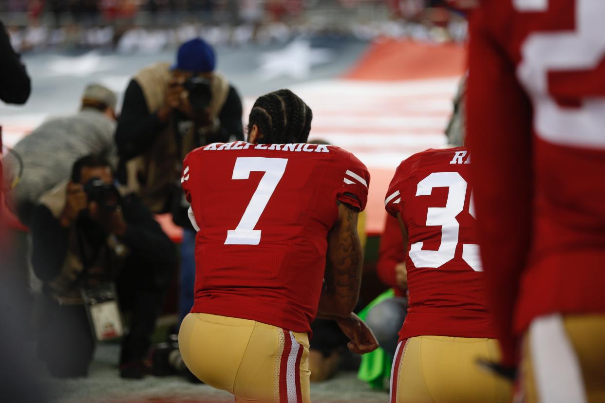 SANTA CLARA, CA - SEPTEMBER 12:San Francisco 49ers quarterback Colin Kaepernick (7) kneels during the National Anthem before their game against the Los Angeles Rams for their NFL game at Levi's Stadium in Santa Clara, Calif., on Monday, Sept. 12, 2016. (Photo by Nhat V. Meyer/MediaNews Group/The Mercury News via Getty Images)