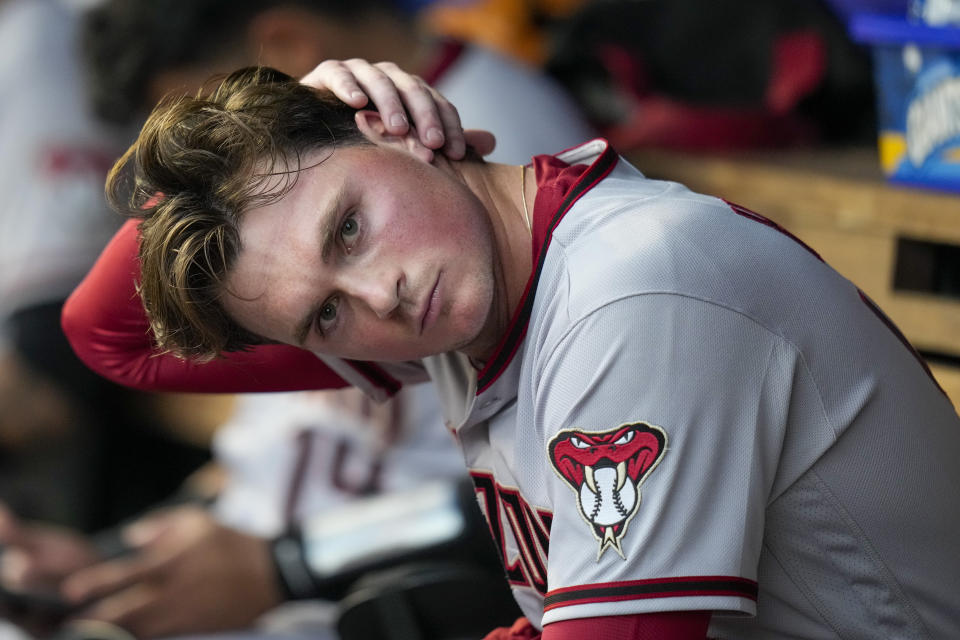 Arizona Diamondbacks starting pitcher Tommy Henry sits in the dugout during the third inning of the team's baseball game against the Washington Nationals at Nationals Park, Tuesday, June 6, 2023, in Washington. (AP Photo/Alex Brandon)