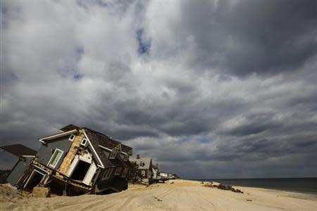 A home destroyed nearly five months ago during the landfall of Superstorm Sandy is pictured in Mantoloking, New Jersey March 22, 2013. REUTERS/Lucas Jackson