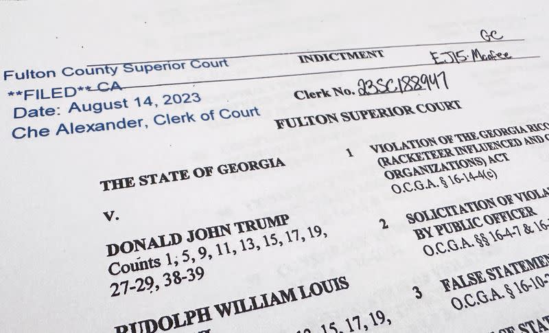 A criminal indictment from a Fulton County, Georgia grand jury shows charges against former President Donald Trump and 18 other defendants