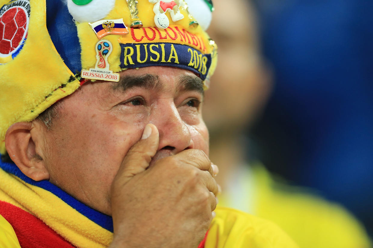 A World Cup spectator in Moscow after a match between Colombia and England, July 3.&nbsp;Since the start of the World Cup in the middle of June, we&rsquo;ve been bombarded with troubling U.S. and international headlines. (Photo: Amin Mohammad Jamali / Getty Images)