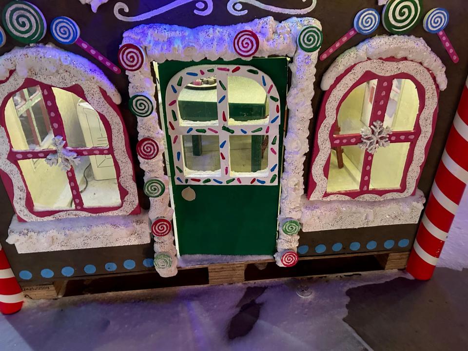 Looking inside the Somerset Area School District's gingerbread house.