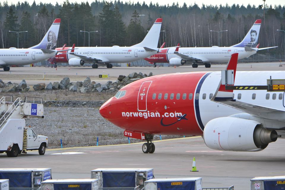 Parked Boeing 737-800 aircrafts belonging to budget carrier Norwegian seen at at Stockholm Arlanda Airport Thursday March 5, 2015. 650 pilots employed by Norwegian Air Norway (NAN) are on strike grounding flights in Norway, Sweden and Denmark.  (AP Photo/Johan Nilsson / TT)  SWEDEN OUT