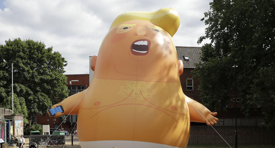 Protesters plan to fly a giant balloon over Parliament during President Trump’s London visit. (AP)