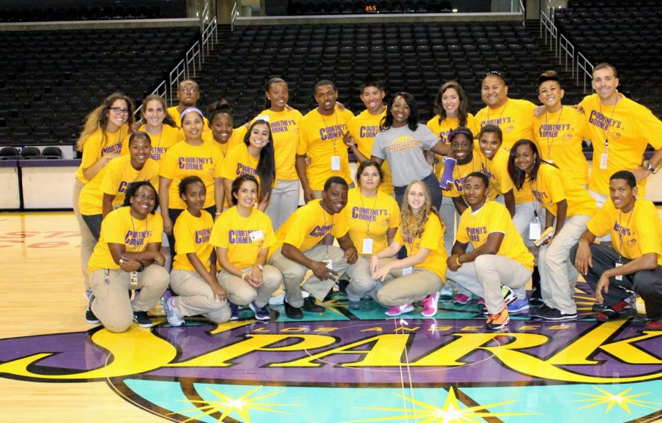 Sparks trainer Courtney Watson (center in gray T-shirt) with sports medicine interns.