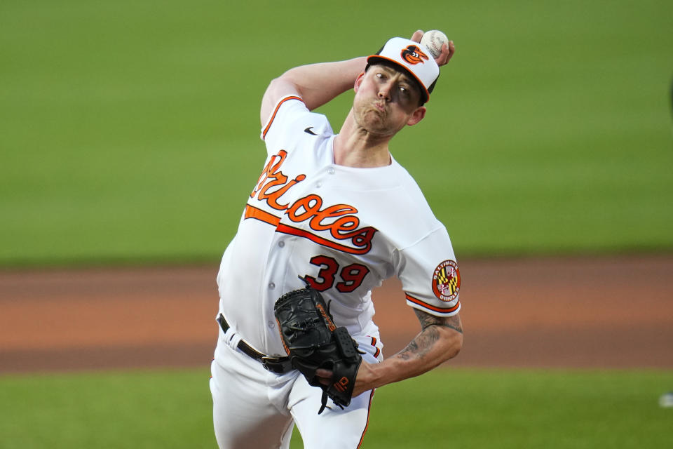Baltimore Orioles starting pitcher Kyle Bradish throws a pitch to the Toronto Blue Jays during the fourth inning of a baseball game, Wednesday, June 14, 2023, in Baltimore. (AP Photo/Julio Cortez)