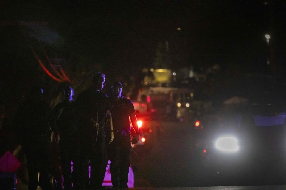 Police officers leave the scene of the investigation following a deadly shooting at the Gilroy Garlic Festival in Gilroy, California on July 28, 2019. | Philip Pacheco—AFP/Getty Images