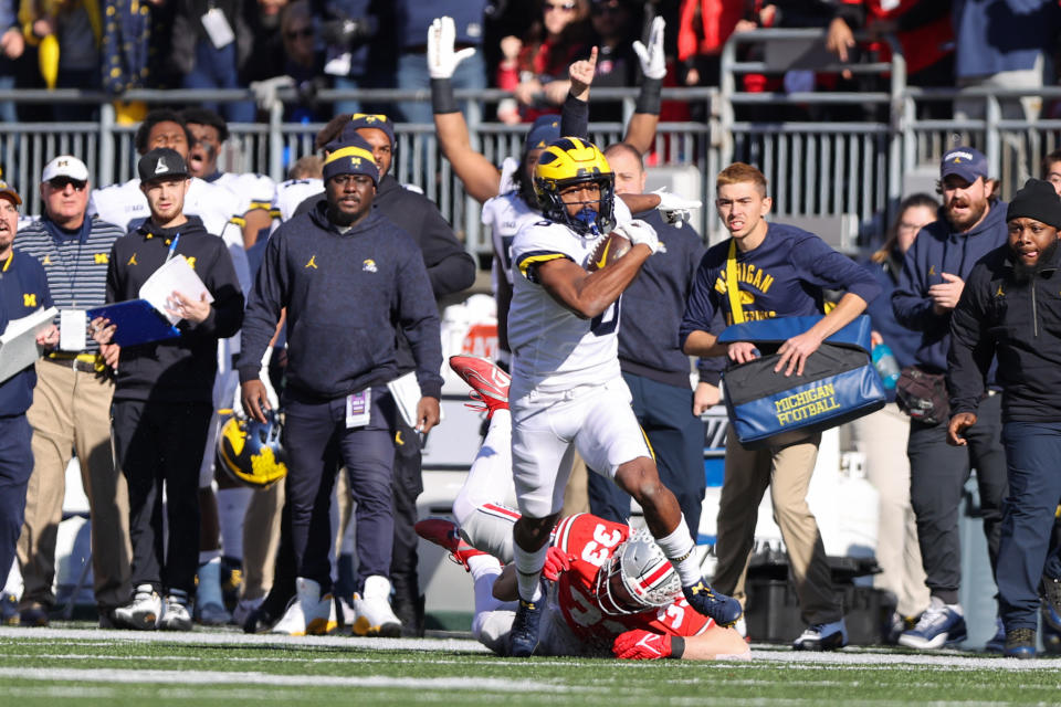 Michigan Wolverines wide receiver Cornelius Johnson (6) races down the sideline as he scores a touchdown against the Ohio State Buckeyes on Nov. 26, 2022, at Ohio Stadium in Columbus, Ohio. (Photo by Frank Jansky/Icon Sportswire via Getty Images)