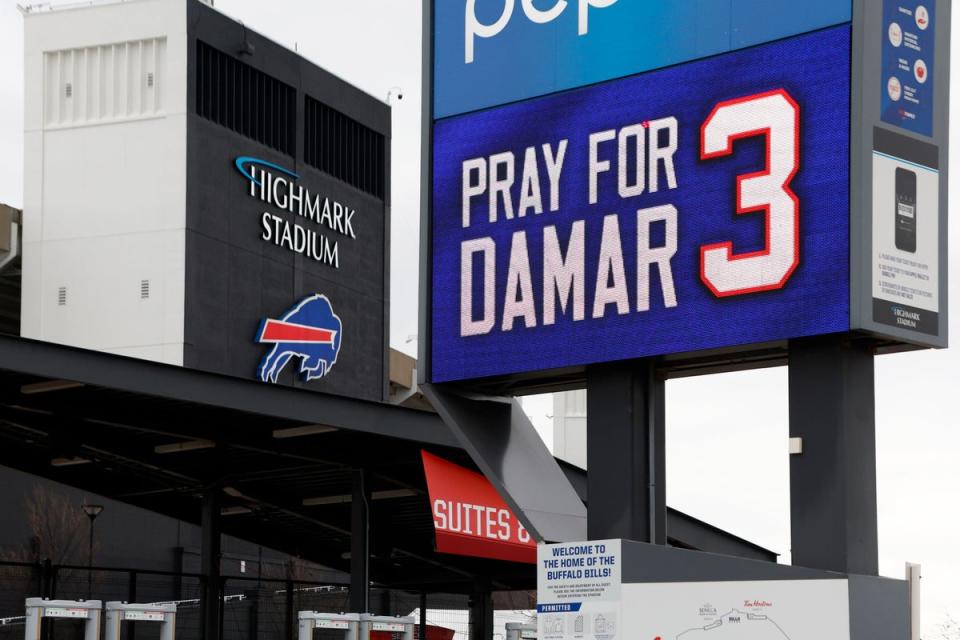 A sign shows support for injured Buffalo Bills NFL player Damar Hamlin outside Highmark Stadium in Orchard Park (Jeffrey T. Barnes/AP) (AP)