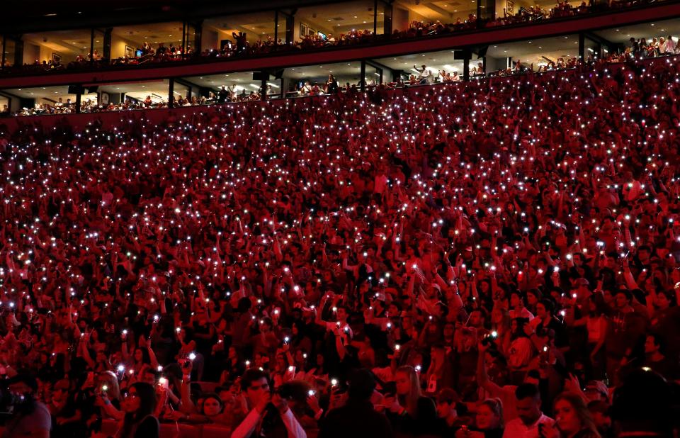Oct 23, 2021; Tuscaloosa, Alabama, USA; Fans create a panoply of light using their cell phones during a break in the game with Tennessee at Bryant-Denny Stadium. Mandatory Credit: Gary Cosby Jr.-USA TODAY Sports