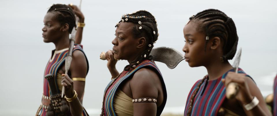 From left, Shelia Atim, Viola Davis and Thuso Mbedu star as warriors in an all-female army in "The Woman King."