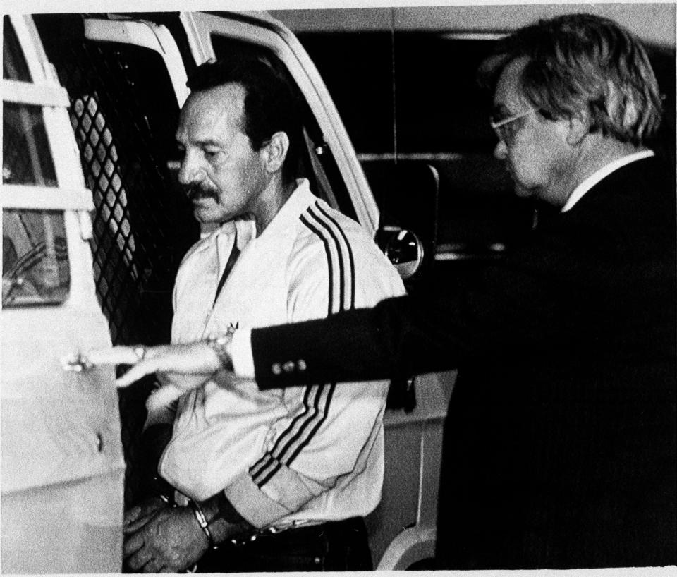 Ralph "Sonny" Barger, left, the founder and president of the Oakland, Calif., Hells Angels chapter, is led to a waiting van by a U.S. marshal after being arraigned on an explosives charge at the Federal Building in San Francisco, Nov. 10, 1987. Hells Angels in five states were arrested on drugs and weapons charges.