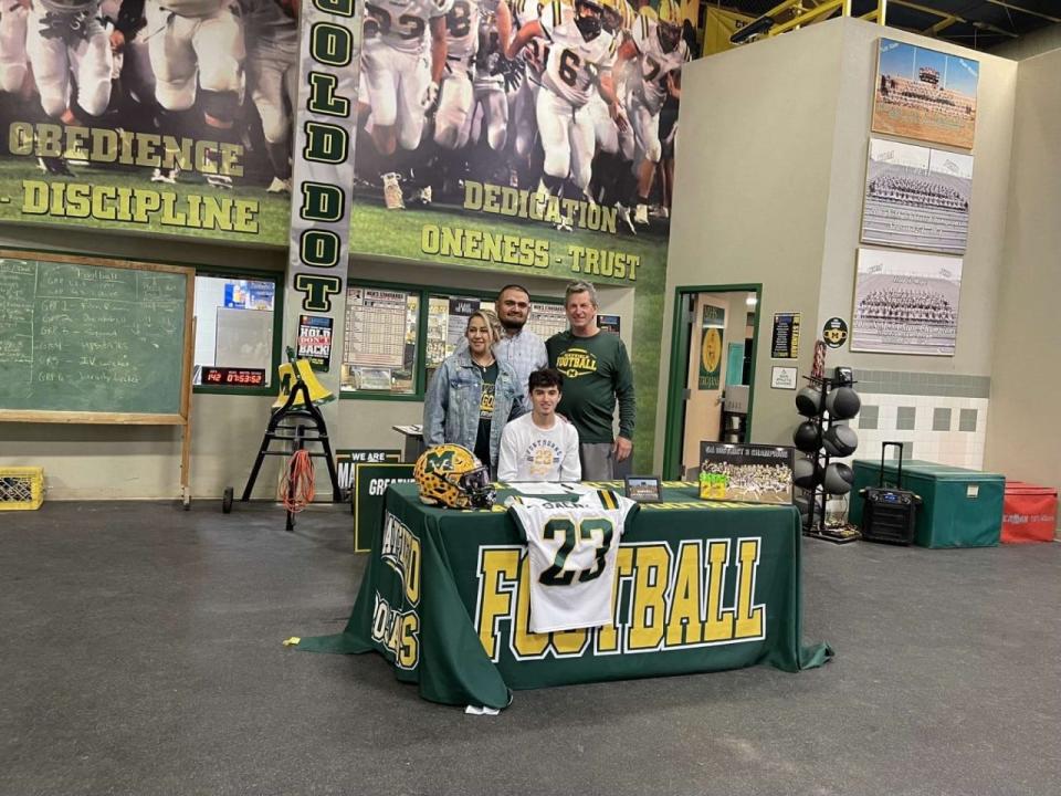 Mayfield football player Felix Saenz signed to play college football at Fontbonne University.