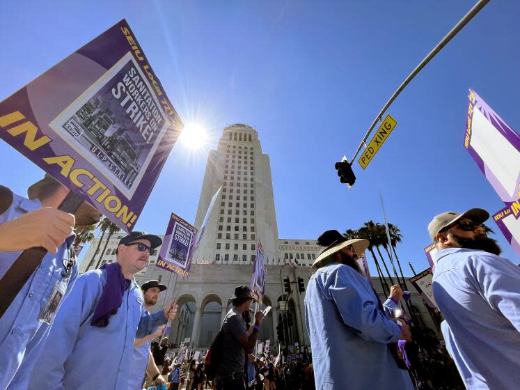 LOS ANGELES CA AUGUST 8, 2023 - Thousands of city workers walked a picket line out in front of Los Angeles City Hall Tuesday, Aug. 8, 2023, for a scheduled 24-hour work stoppage prompted by what their union believes is a lack of good-faith labor negotiations. (Gary Coronado / Los Angeles Times