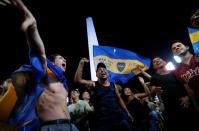 Aficionados de Boca Juniors celebran en el centro de Buenos Aires el título de la Superliga