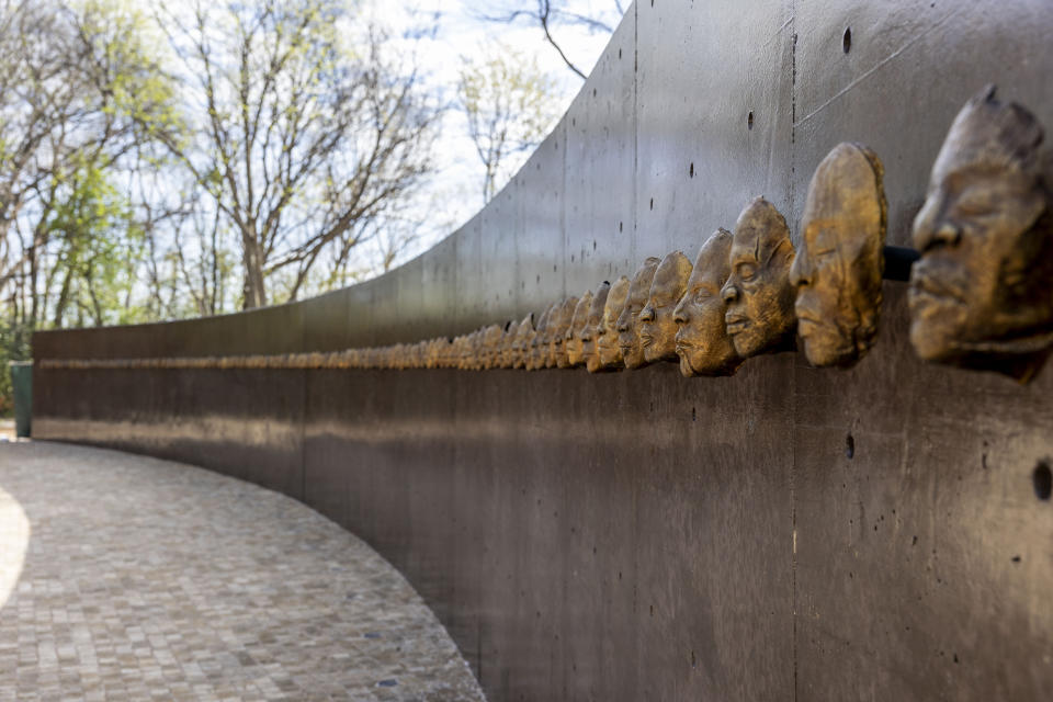 "108 Death Masks," by Nikesha Breeze, ceramic cast in bronze, 2018, during a media tour of Equal Justice Initiative's new Freedom Monument Sculpture Park, Tuesday, March 12, 2024, in Montgomery, Ala. (AP Photo/Vasha Hunt)