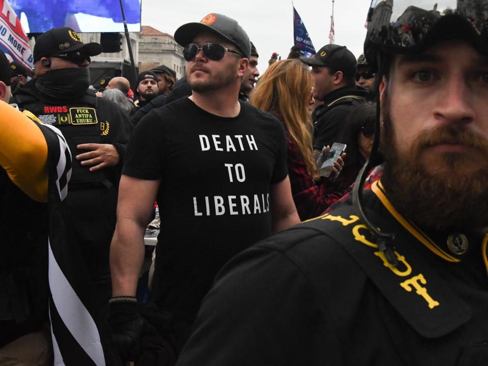 proud boy in shirt that says "death to liberals"