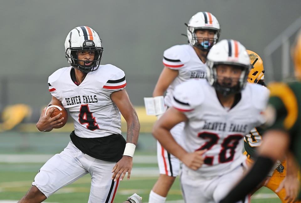 Beaver Falls' Isaiah Aeschbacher carries the ball during Friday's game at Blackhawk.