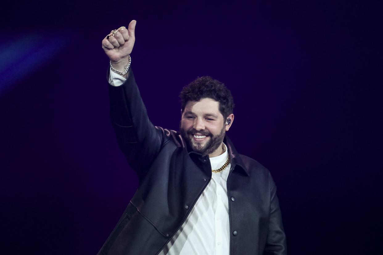 United Kingdom's James Newman appears on stage during the second semi-final of the 65th edition of the Eurovision Song Contest 2021, at the Ahoy convention centre in Rotterdam, on May 20, 2021. (Photo by KENZO TRIBOUILLARD / AFP) (Photo by KENZO TRIBOUILLARD/AFP via Getty Images)