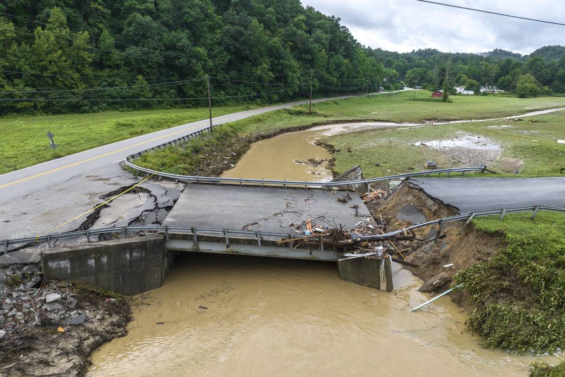 A bridge across Grapevine Creek at Chavies School Road in Perry County, Ky., is heavily damaged Tuesday, Aug. 2, 2022, following catastrophic flooding last week.