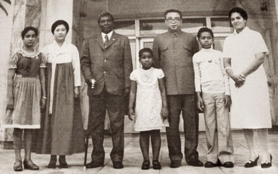 Monica Macias (centre) with her family and North Korea's First Couple, Kim Il-sung and Kim Song-ae - Duckworth