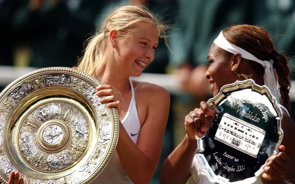 Defending champion Serena Williams of the US and winner Maria Sharapova of Russia (L) hold their trophies following the ladies' singles final on Centre Court at the All England Lawn Tennis Championships in Wimbledon, Saturday 03 July 2004 - The Tennis Podcast: Maria Sharapova and Serena Williams in 2004 - the making of an unrivalry - REX