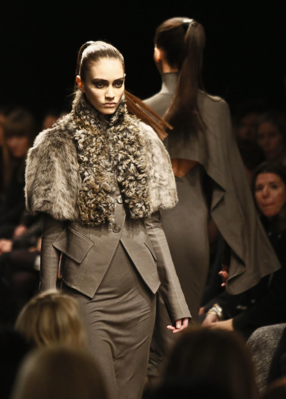 Fashion from the Fall 2013 collection of Donna Karan New York is modeled on Monday, Feb. 11, 2013 in New York. (AP Photo/Bebeto Matthews)