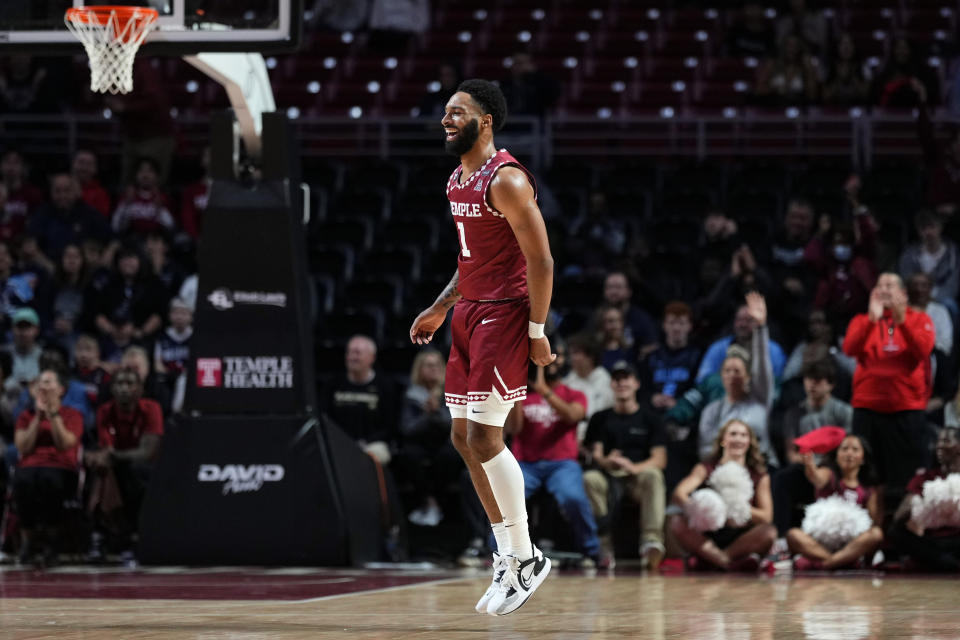 Temple's Damian Dunn reacts after making a basket during the first half of an NCAA college basketball game against Villanova, Friday, Nov. 11, 2022, in Philadelphia. (AP Photo/Matt Slocum)