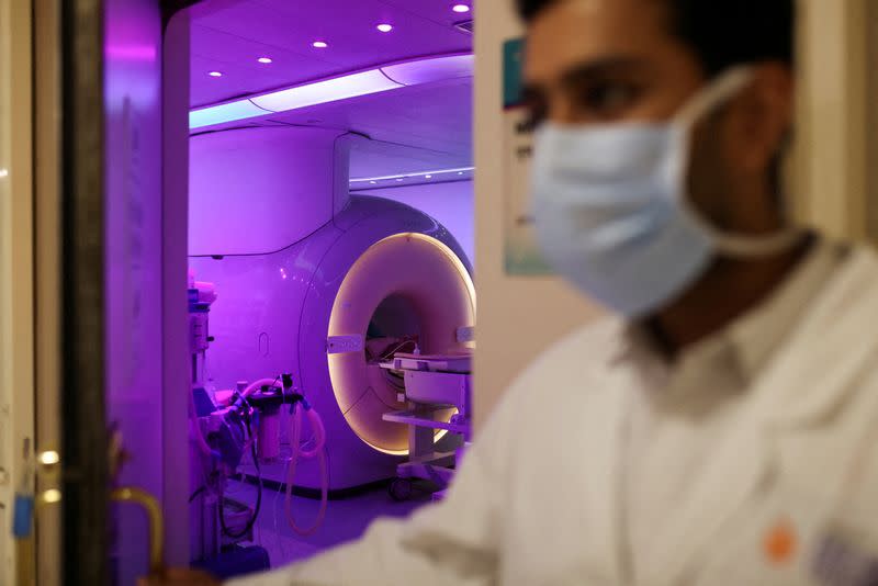 FILE PHOTO: A doctor exits from a MRI room at a hospital in New Delhi