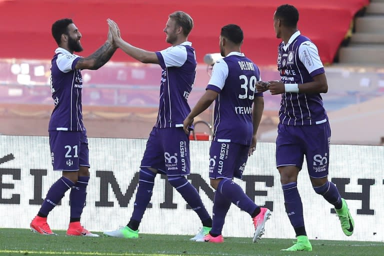 Toulouse's Ola Toivonen (2nd R) celebrates after scoring a goal against Monaco on April 29, 2017 at the "Louis II Stadium" in Monaco