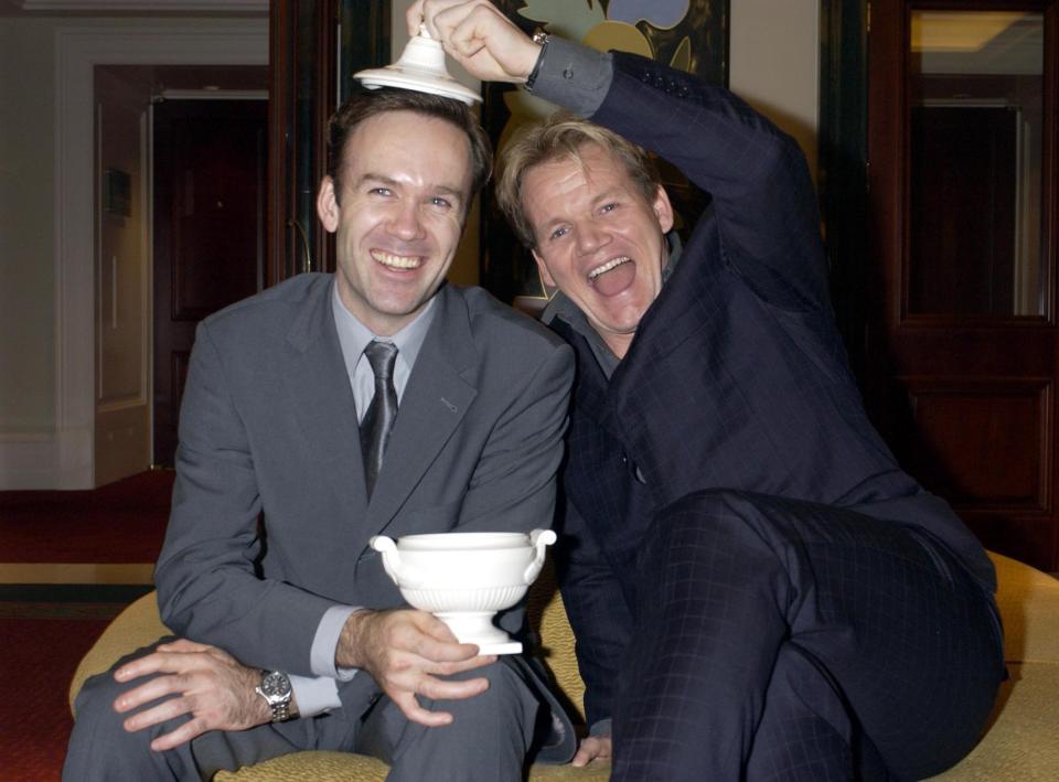 Chef and owner of 'Petrus' Gordon Ramsay (right) with head chef Marcus Wareing after they recieved  the AA Restaurant of the Year Award during a ceremony at the Renaissance London, Chancery Court Hotel, London.   (Photo by William Conran - PA Images/PA Images via Getty Images)