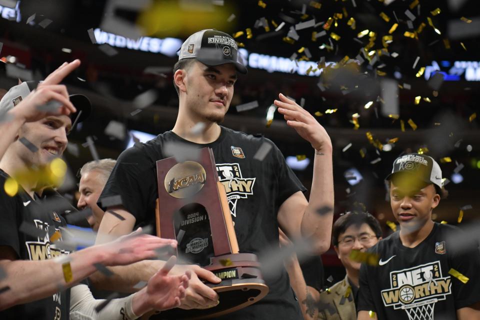 Center Zach Edey celebrates Purdue's 72-66 win over Tennessee in this year's Midwest Regional final.