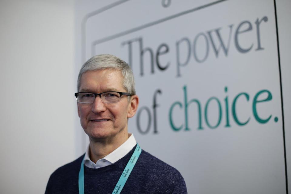 Apple chief executive Tim Cook has said the company is spending a tremendous amount of time and effort on AI (Yui Mok/PA) (PA Archive)