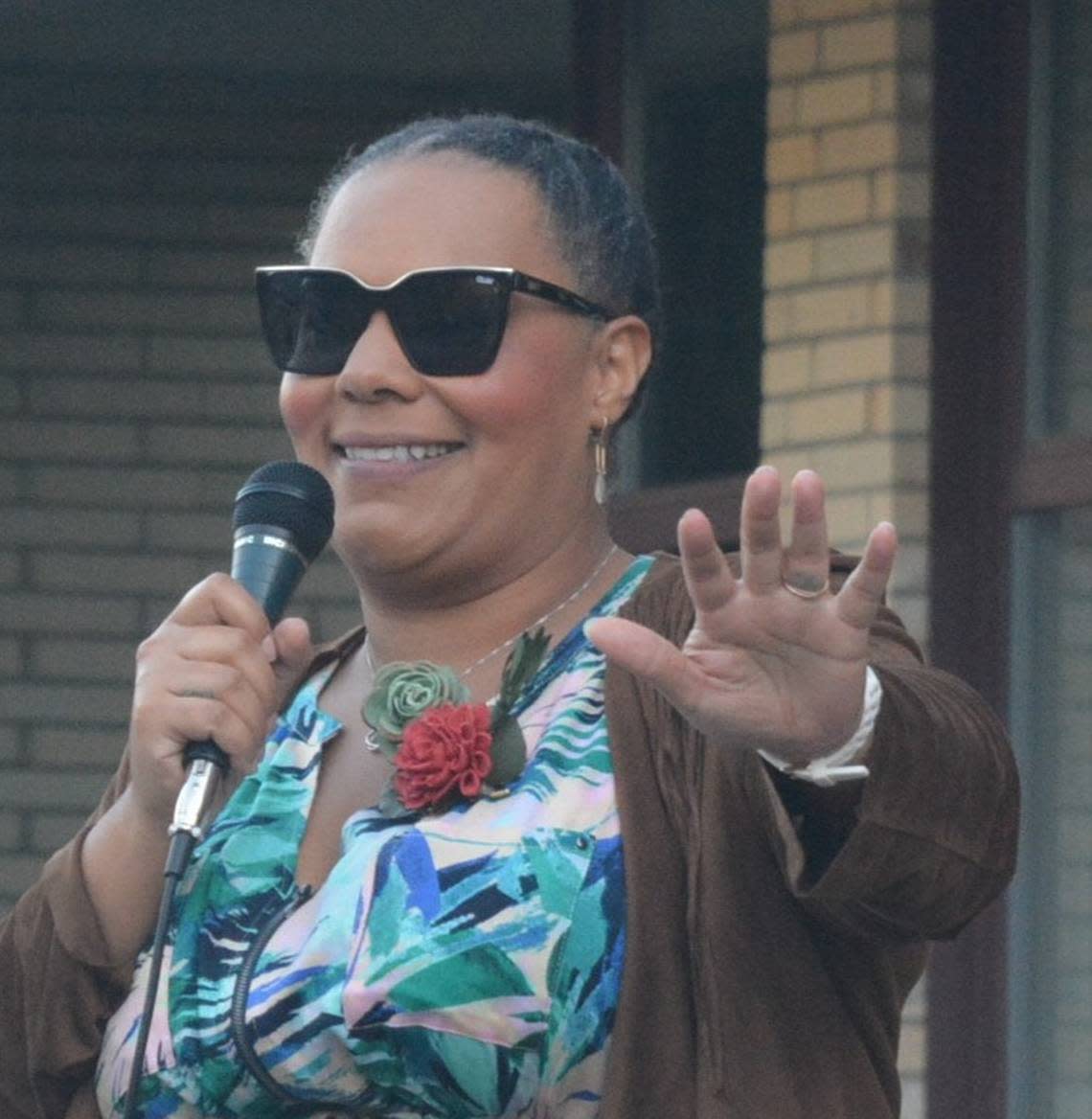 Bellingham City Councilwoman Kristina Michele Martens addresses supporters at a rally for the Whatcom County Racial Equity Commission, which she helped form, on Oct. 11, 2022, outside the Bellingham Public Library. Robert Mittendorf/The Bellingham Herald