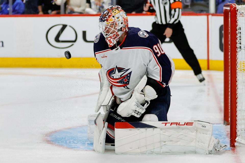 Mar 22, 2024; Denver, Colorado, USA; Columbus Blue Jackets goaltender Elvis Merzlikins (90) makes a save in the second period against the Colorado Avalanche at Ball Arena. Mandatory Credit: Isaiah J. Downing-USA TODAY Sports