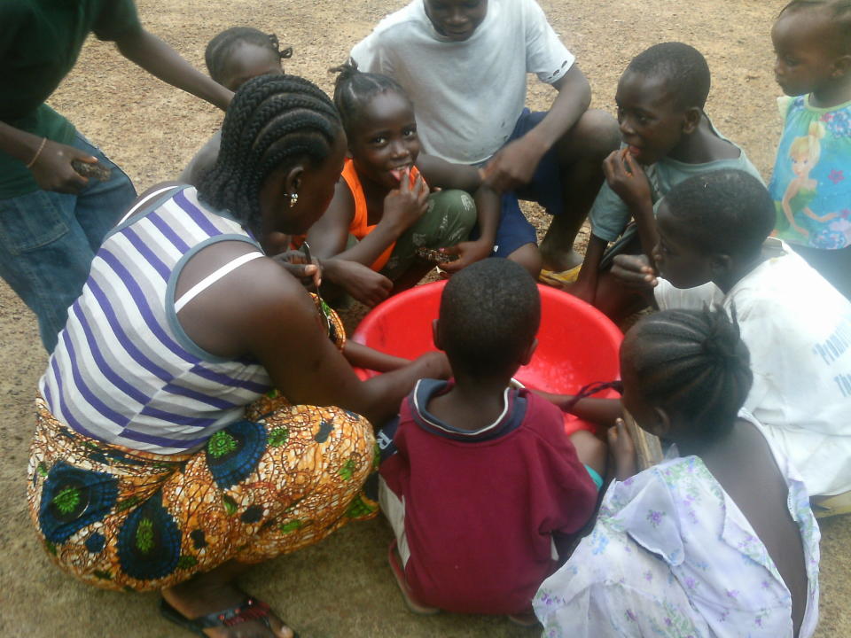 "Before the crisis, we used to all eat together. Children from neighboring houses would come together to help prepare a large amount of food that we would then eat together as a community. Since the crisis, people are not doing this as much as they used to. There is still a lot of division within our community since the Ebola crisis," Hawa Singbeh, from Gbolakai-Ta, said. "That's why I prepared a large meal for us to eat together,&nbsp;to demonstrate that we can return to our normal customs and eat together again. This is another way we can overcome stigma in our community."