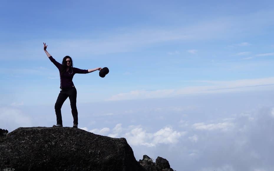 <p>My best friend, Terasa Sciortino, wanted me to jump up onto this rock and show off the beautiful terrain above the clouds.</p>