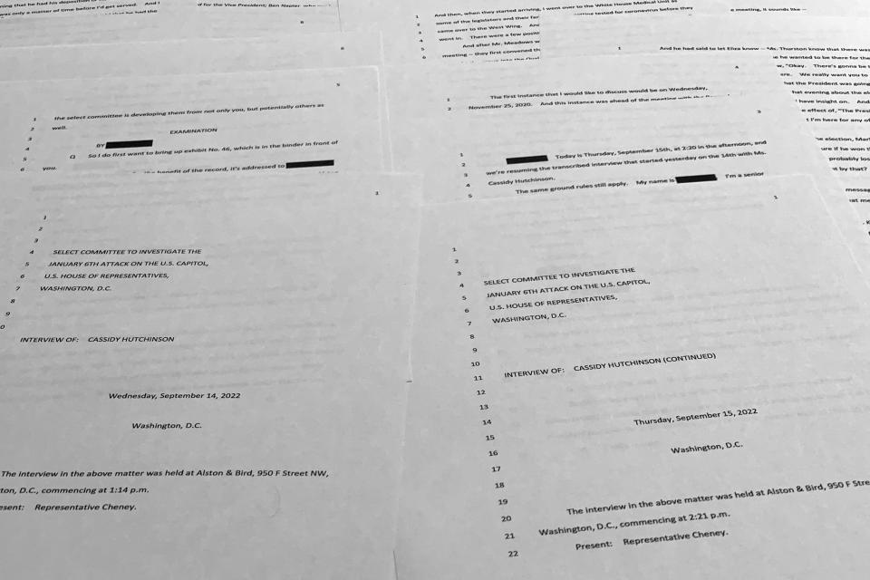 Transcripts from the interview with Cassidy Hutchinson, former aide to Trump White House chief of staff Mark Meadows, released by the House select committee investigating the Jan. 6 attack on the U.S. Capitol, are photographed Thursday, Dec. 22, 2022. Hutchinson told the committee that her first lawyer advised her against being fully forthcoming with the panel, telling her, “the less you remember, the better,” according to a transcript of one of her interviews released Thursday. (AP Photo/Jon Elswick)