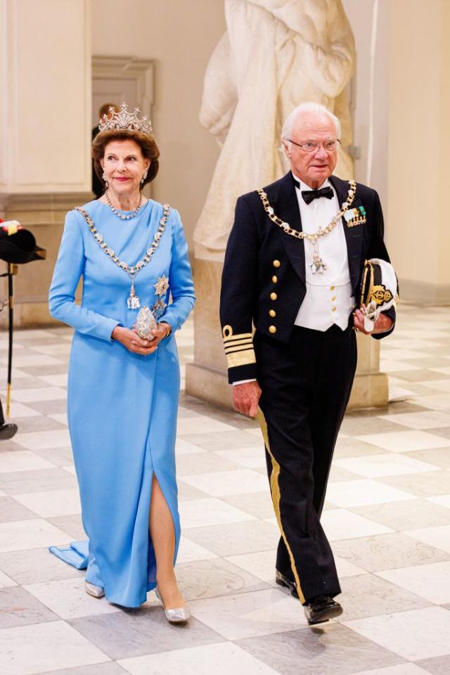 Sweden's Princess Madeleine, left holding Prince Nicolas stands next to her  husband Christopher O'Neill holding their daughter Princess Leonore, with  Queen Silvia and King Carl XVI Gustaf at right, during the christening