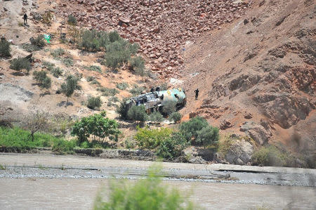 Rescue workers attend the scene of a bus crash in a ravine in Arequipa, Peru February 21, 2018 in this image obtained from social media. Diego Ramos Lupo/Frase Corta via REUTERS