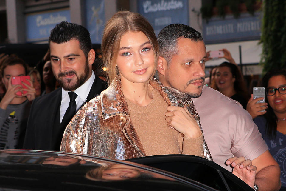 We have to know what’s happening with these totally unique jeans Gigi Hadid just rocked