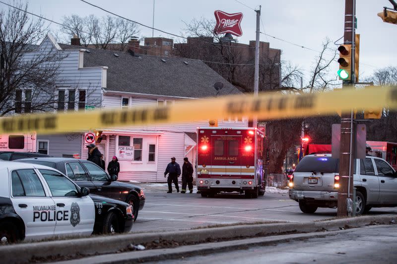 Police investigate a shooting at the Molson Coors headquarters in Milwaukee, Wisconsin