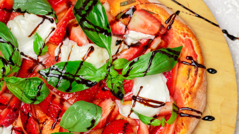 Strawberry salad pizza on plate
