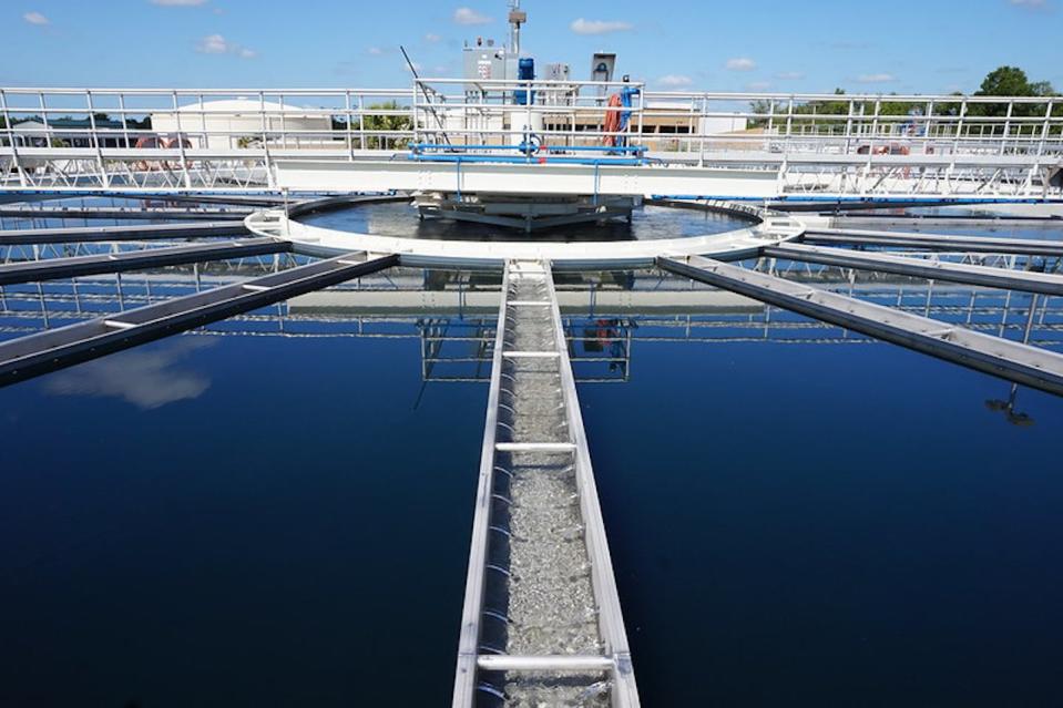 A large tank of water, with fences around the top.